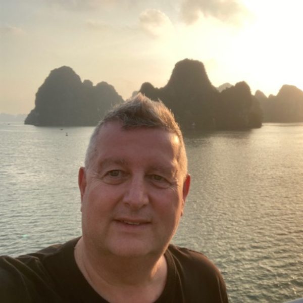 Clive Hetherington. Selfie of man at Ha Long Bay, Vietnam