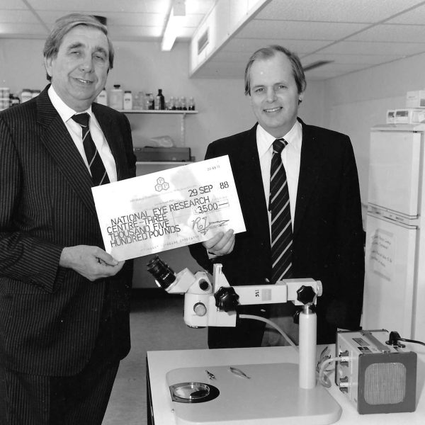 Professor David Easty (right) accepting a cheque for Sight Research UK (formally called the National Eye Research Centre)