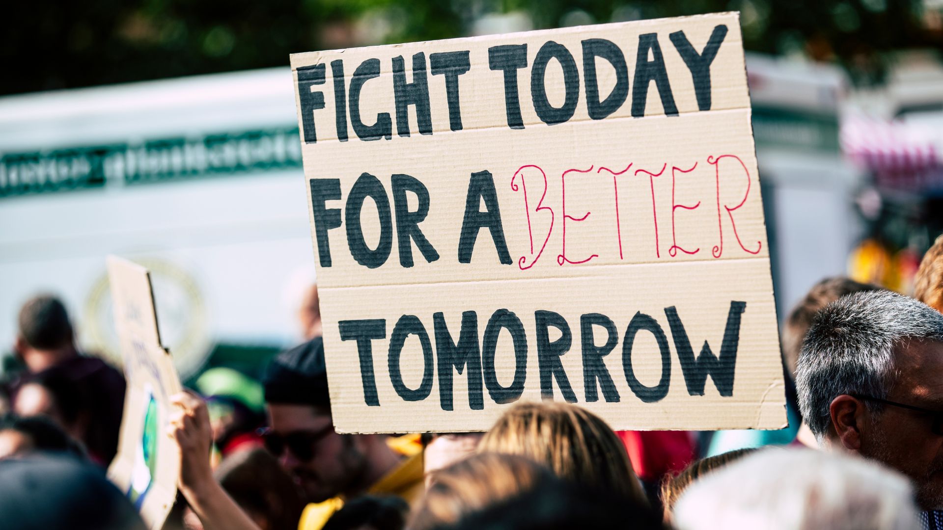 Cardboard sign advocating for change