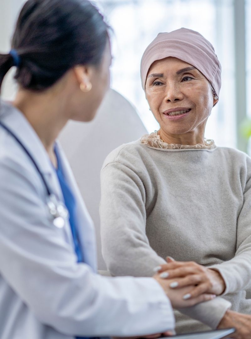 Doctor consulting patient in clinic.