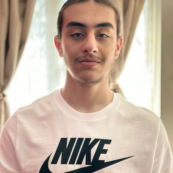Sight Research UK supporter Yousif smiling