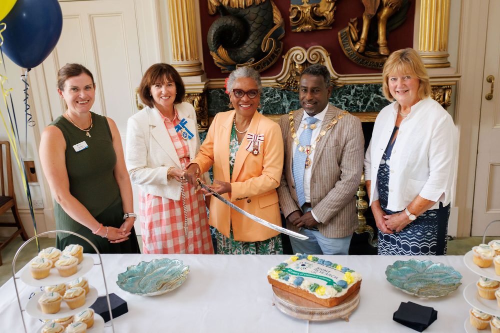 L to R: the CEO, High Sheriff, Lord-Lieutenant, Lord Mayor and Chair of Trustees at 40 years charity event cutting cake